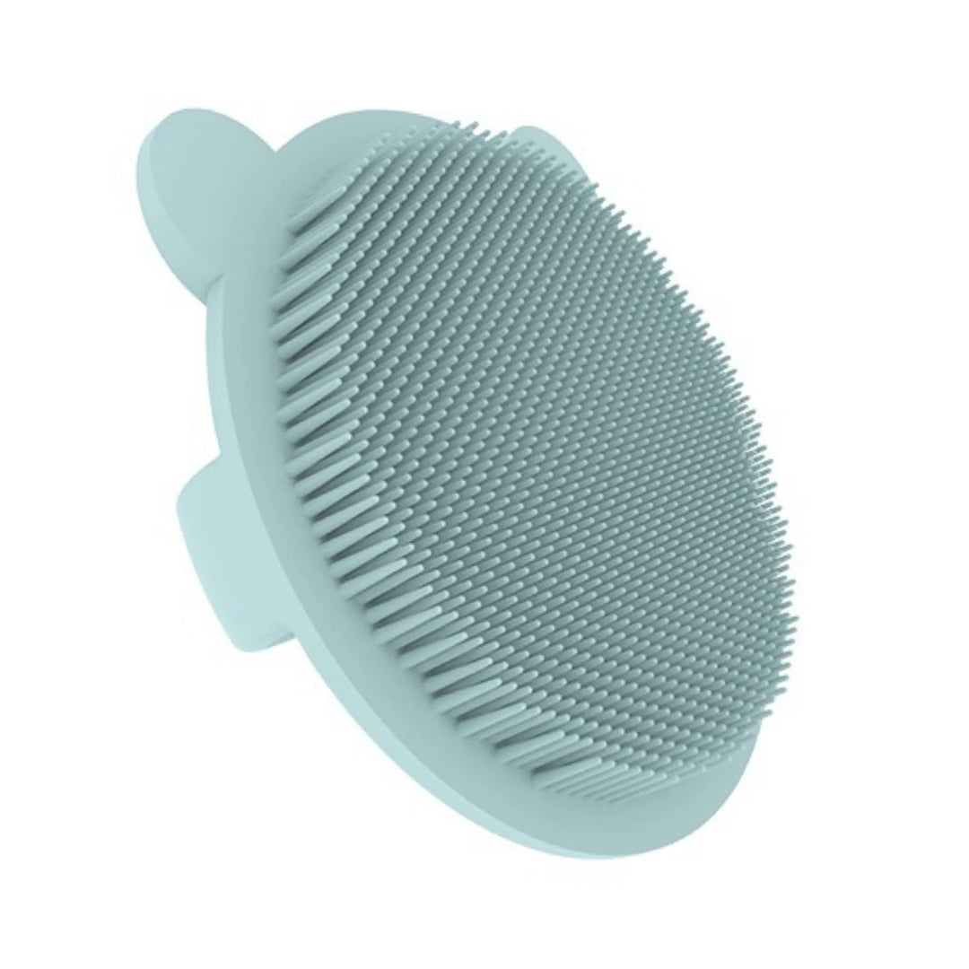 Soft silicone baby bath brush gently cleans baby's hair and body, BPA-free, a safe bathing tool for newborns and children.